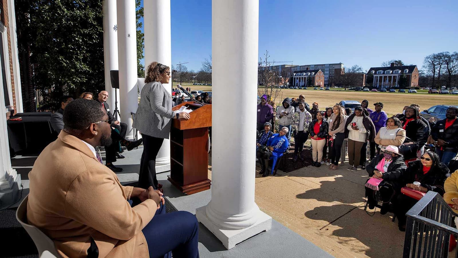 Briana Mercado ‘23, president of the Multicultural Greek Council (MGC), speaks at the dedication ceremony for the Agora